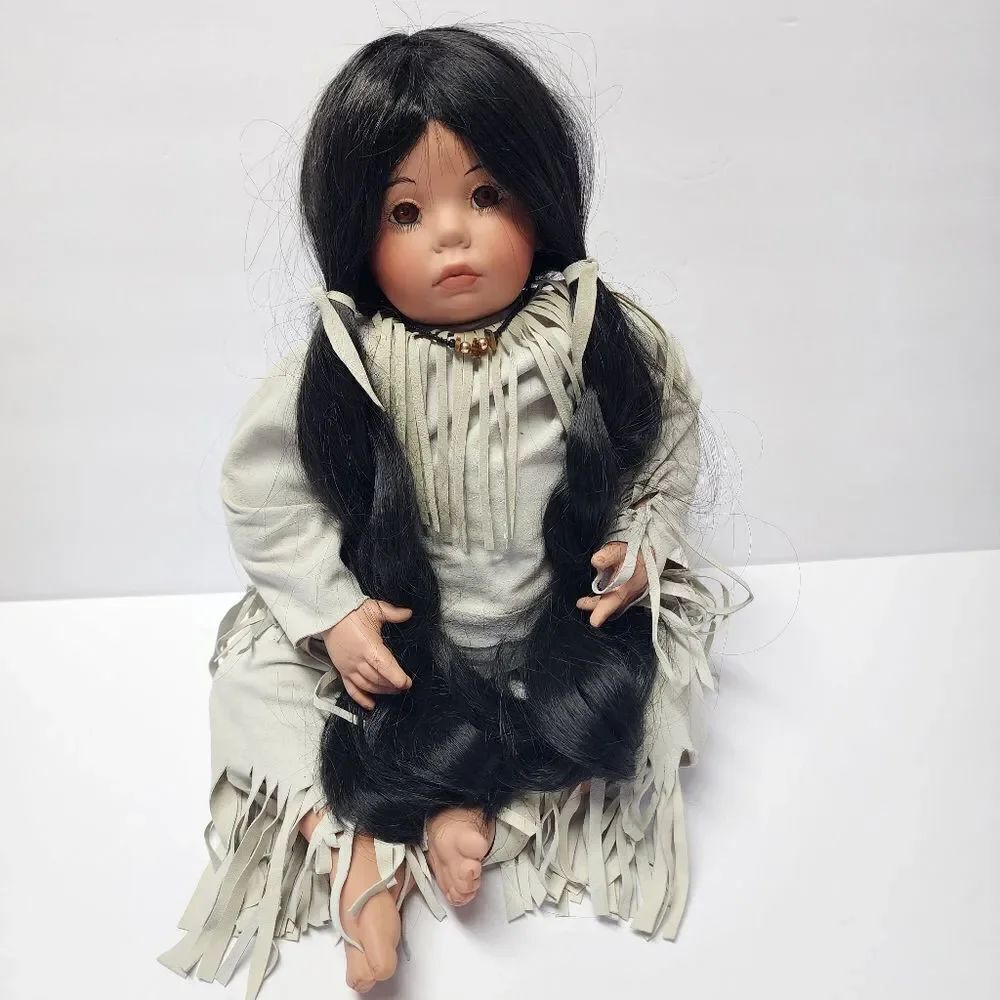 Sitting Native American Porcelain Weighted Doll 12"